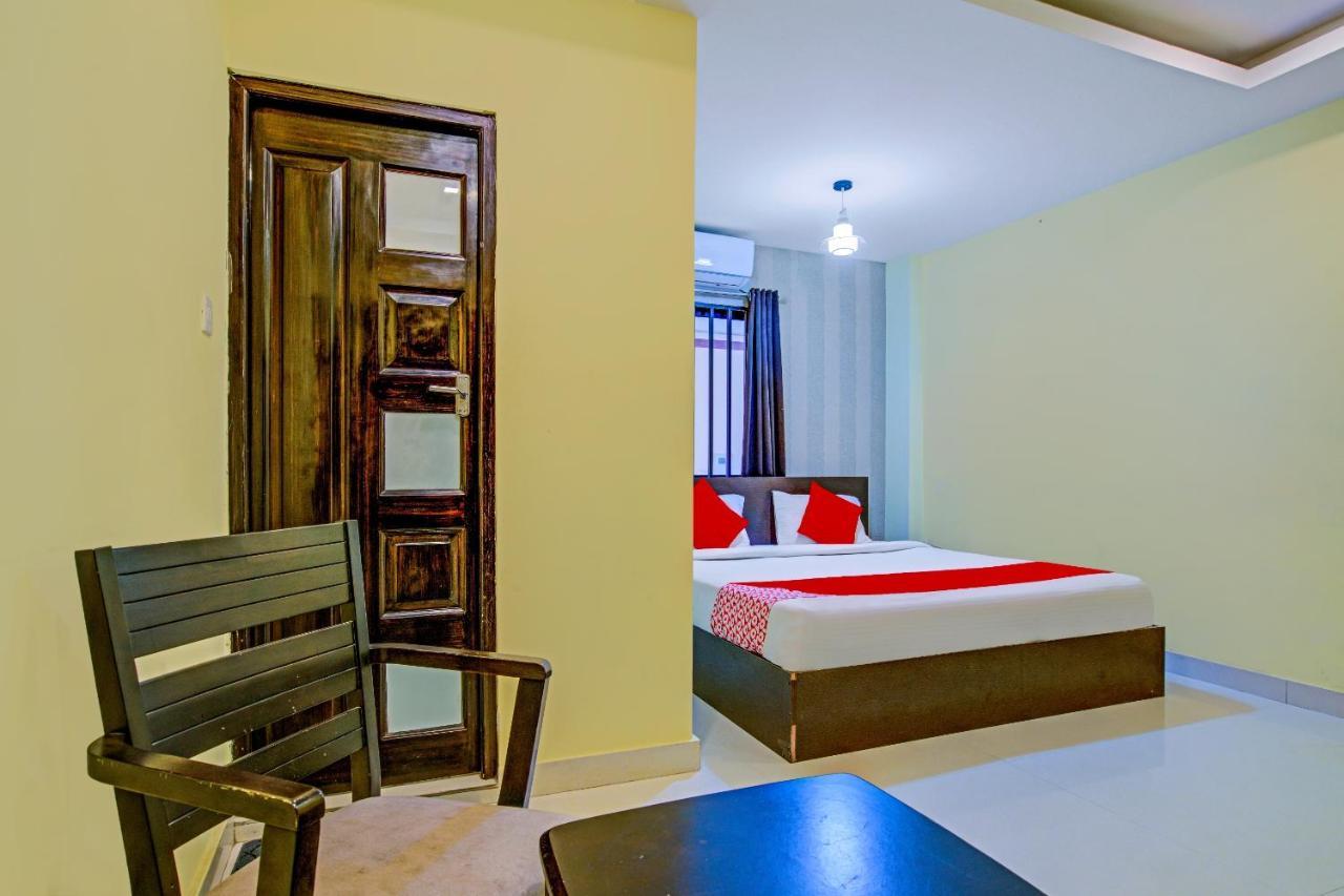 Oyo Flagship 77876 Amigo Suites Коччи Экстерьер фото
